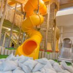 Camping Wirthshof Kinderspielhaus mit Riesenrutsche und Klettergeruest 150x150