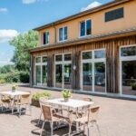 Campingpark Kalletal Terrasse vor der Gemeinschaftskueche mit Blick auf den See 69b64c47 cf96 4109 97fc 1acfa3244917 150x150