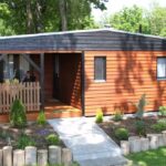 Campingpark Kuehlungsborn Mobilheim vom Campingplatz mit Veranda im Gruenen 150x150