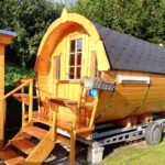 Campingplatz Hetzingen Blick auf Wohnfass mit Terrasse und Aussenkueche auf dem Campingplatz 150x150