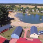 Ferienpark Ploetzky Luftaufnahme des Campingplatzes am See 4b82158b a5ce 4a08 8404 f122cbc2e24a 150x150