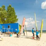 Ostseecamping Familie Heide Windsurfen am Strand vom Campingplatz 150x150
