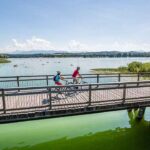 Strandcamping Waging Gaeste bei einer Radtour am Waginger See mit Alpenblick 150x150