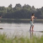 Strandcamping Waging Stand Up Paddler auf dem Waginger See am Campingplatz 150x150