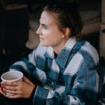 Wildwood Camping Harz Camping Waldweben Camperin sitzt in ihrem Van und geniesst einen Kaffee 7f02d5cf 49b0 487e ac45 8dde49d1e893 150x150