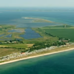 Camping Fluegger Strand Panorama mit Leuchtturm 150x150